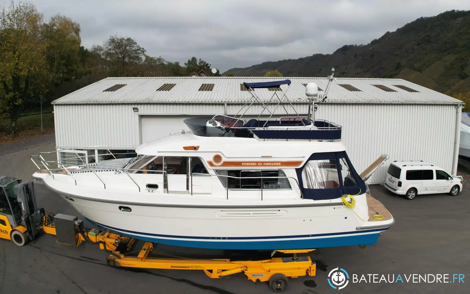 slider 1 Storebro 410 Commander