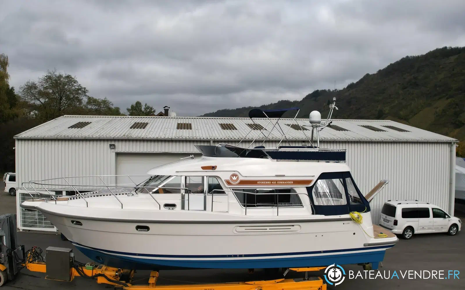 slider 2 Storebro 410 Commander