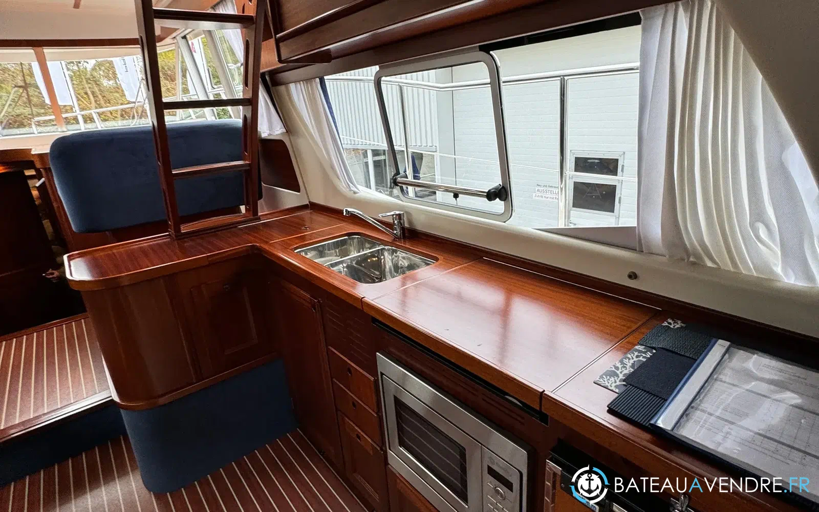 slider 33 Storebro 410 Commander