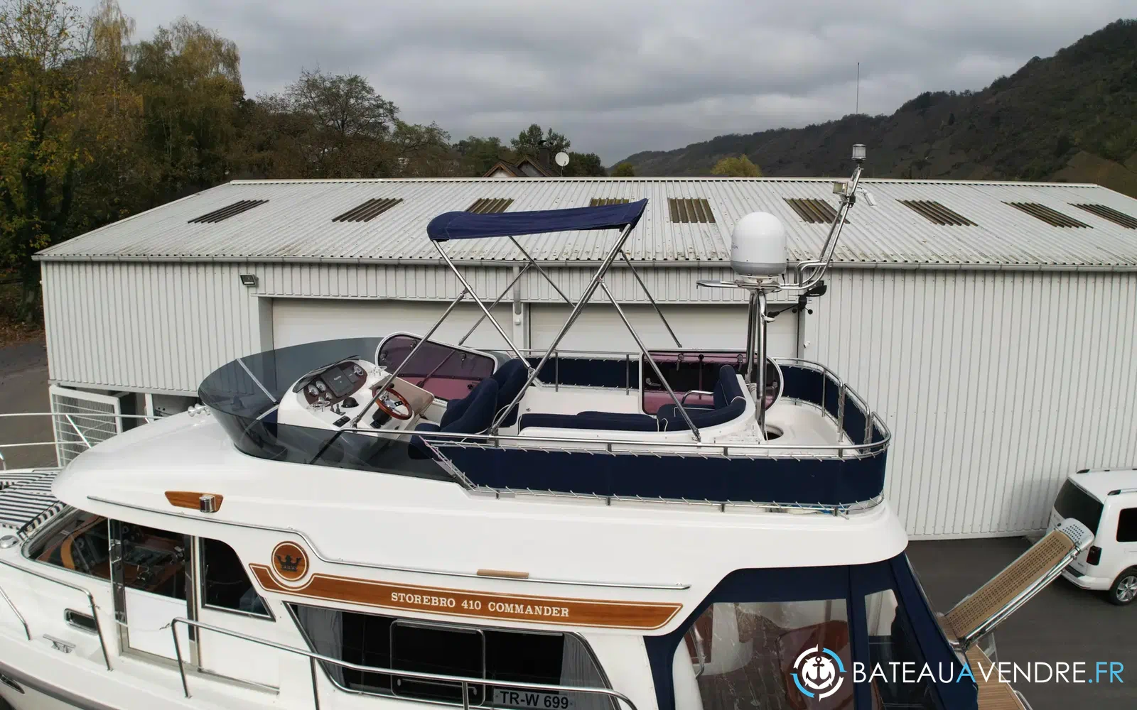 slider 3 Storebro 410 Commander