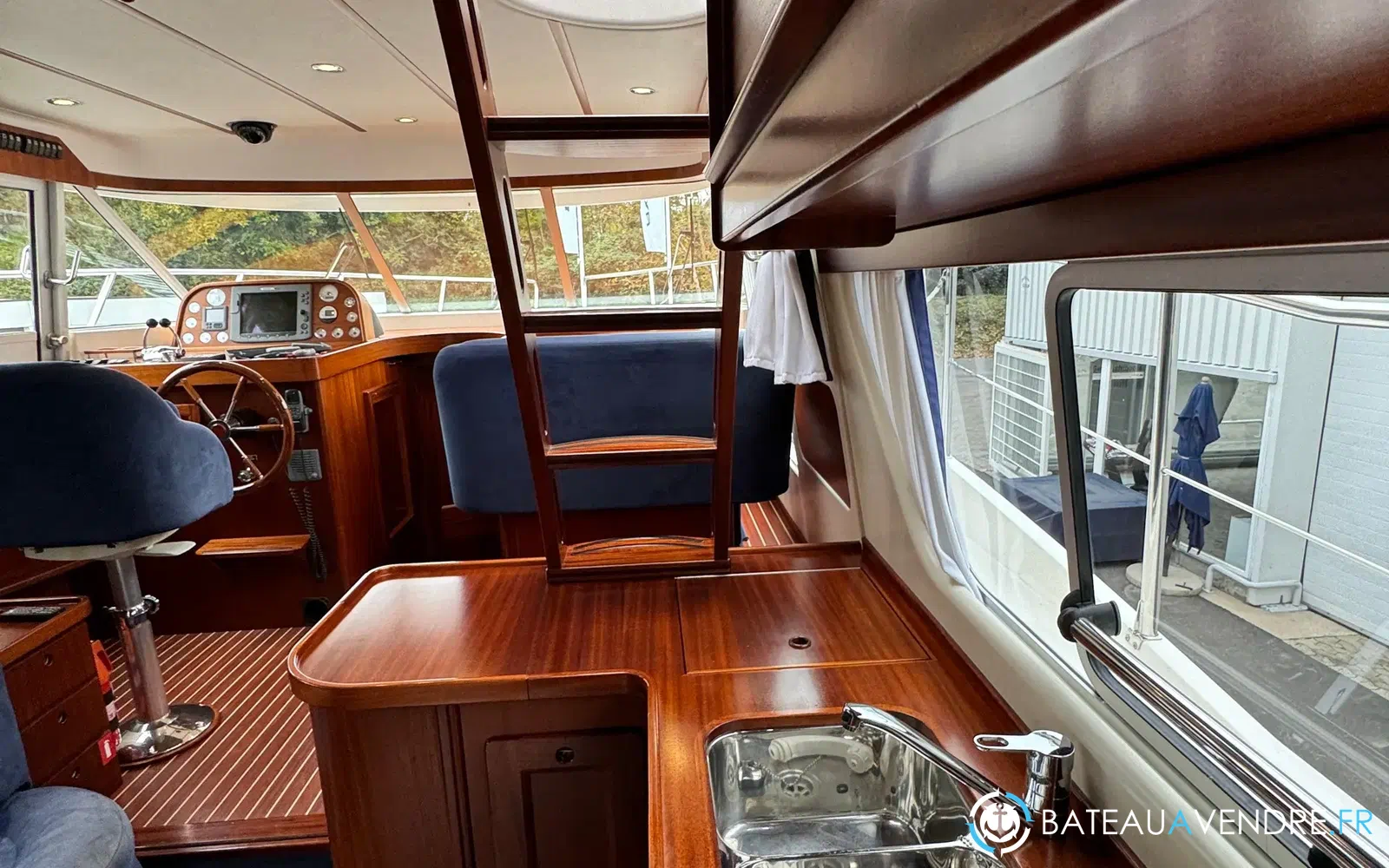 slider 65 Storebro 410 Commander