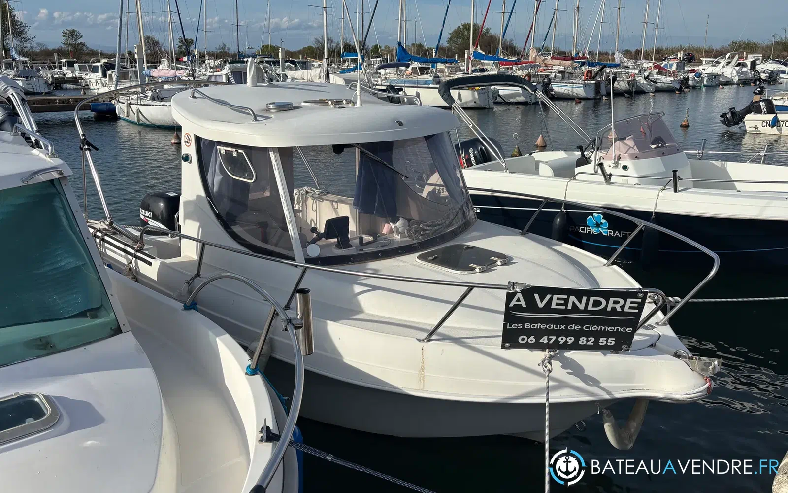 slider 14 Pacific Craft 560 Timonier