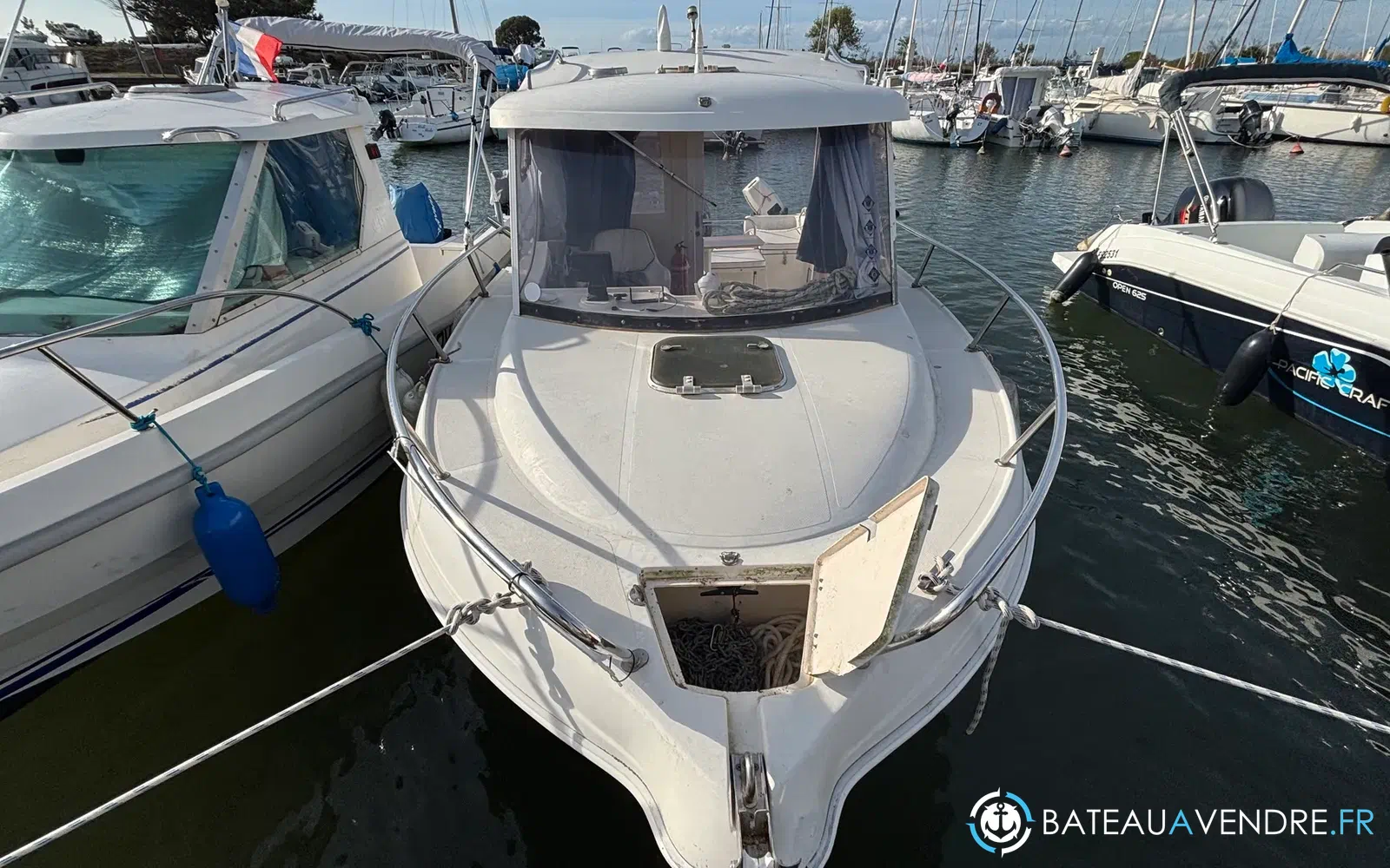 slider 15 Pacific Craft 560 Timonier