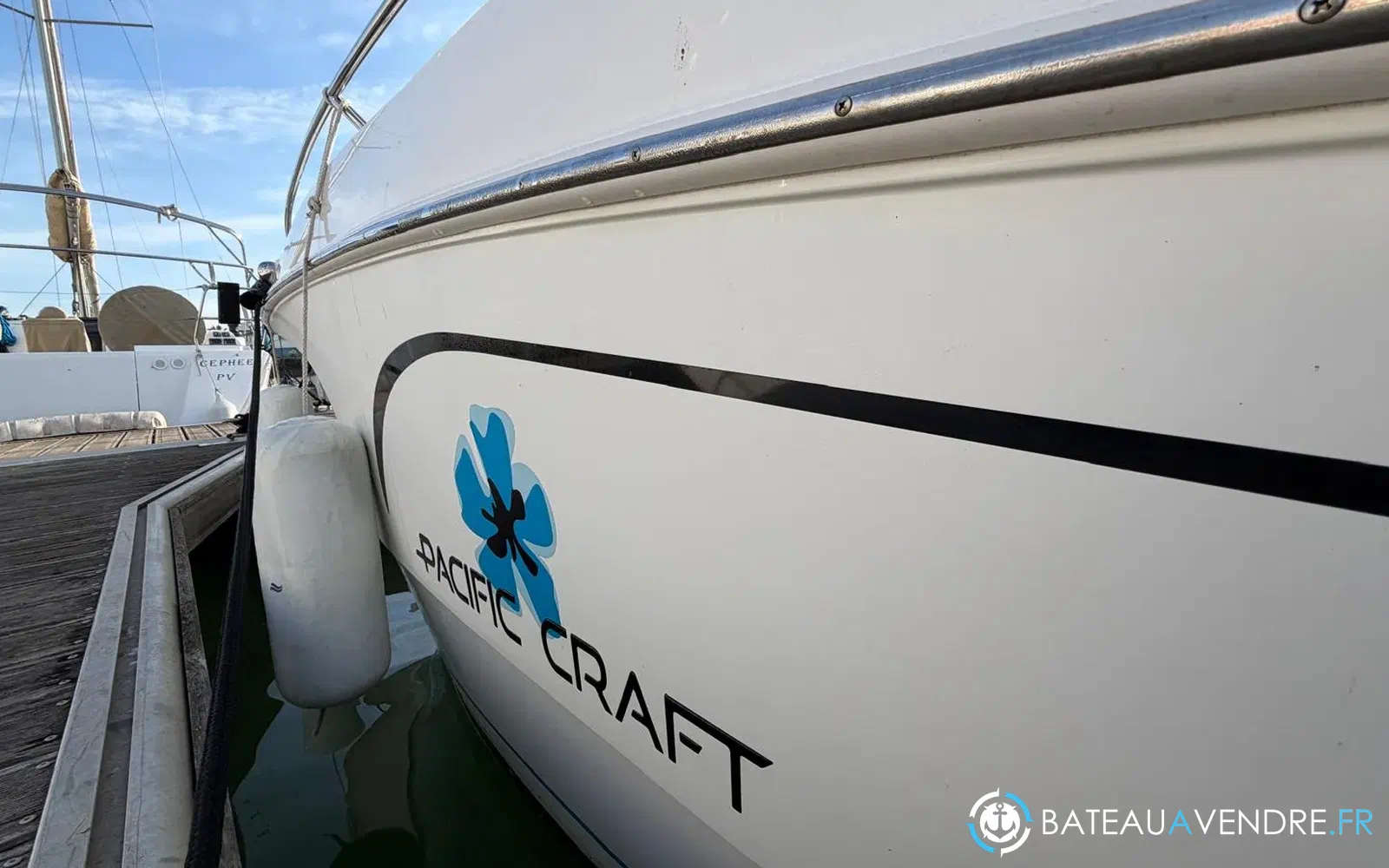 slider 12 Pacific Craft 750 Open