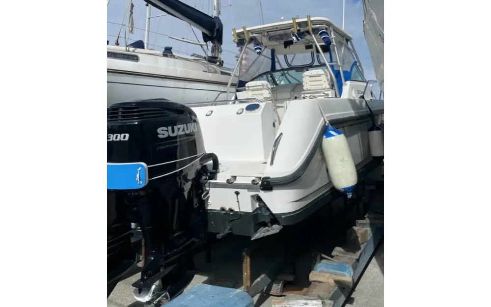 slider 12 Boston Whaler  285 Conquest