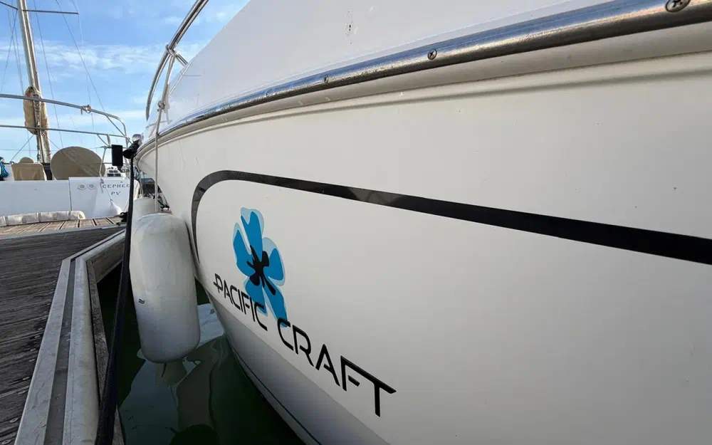 slider 11 Pacific Craft 750 Open