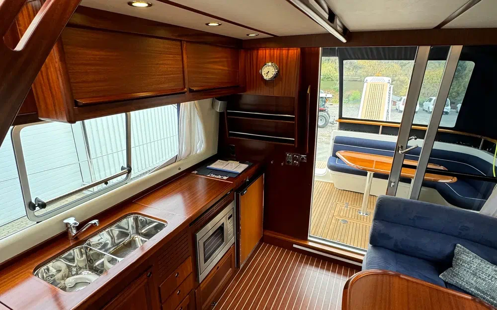 slider 34 Storebro 410 Commander