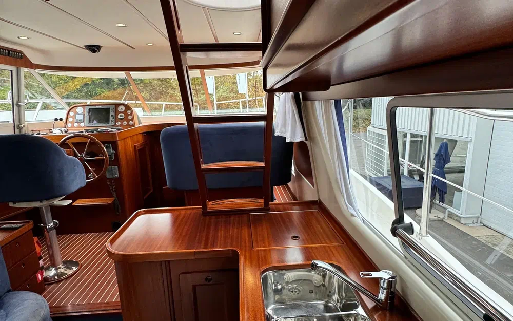 slider 65 Storebro 410 Commander