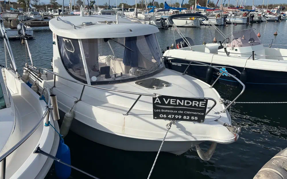 slider 11 Pacific Craft 560 Timonier