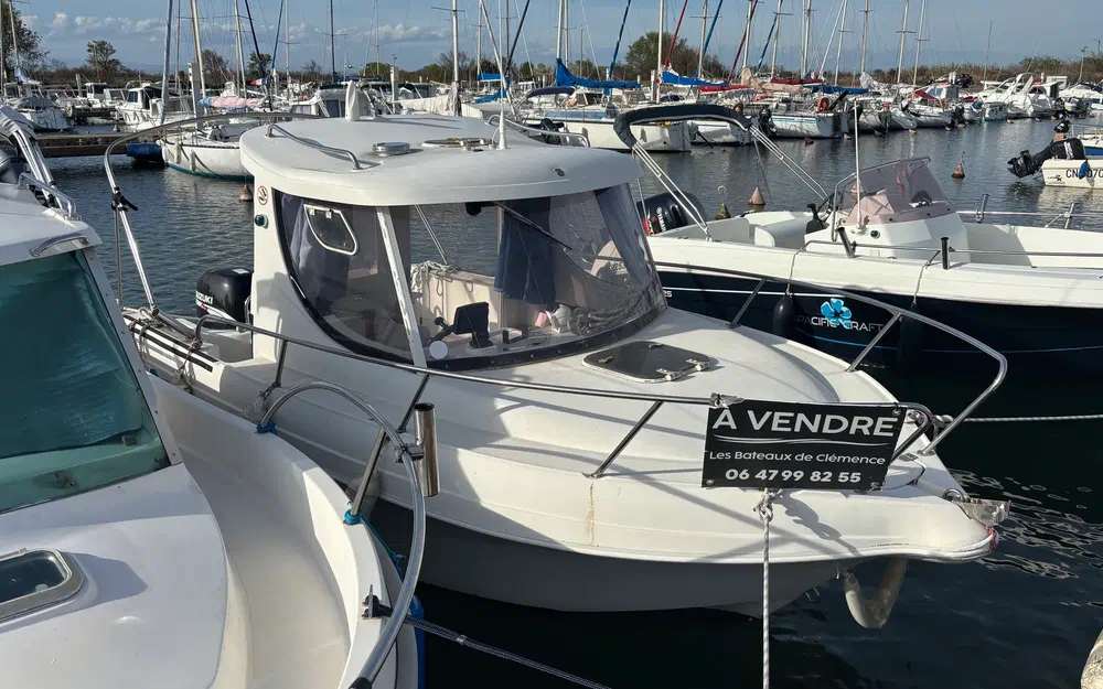 slider 14 Pacific Craft 560 Timonier