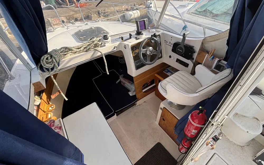 slider 4 Pacific Craft 560 Timonier