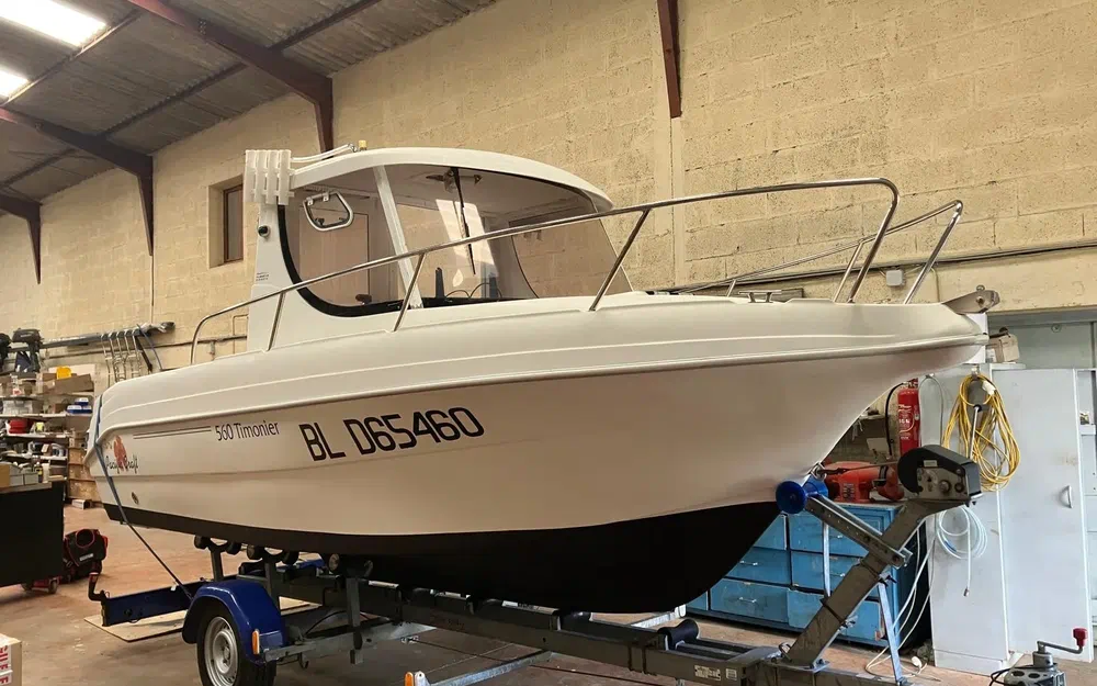 slider 13 Pacific Craft 560 Timonier