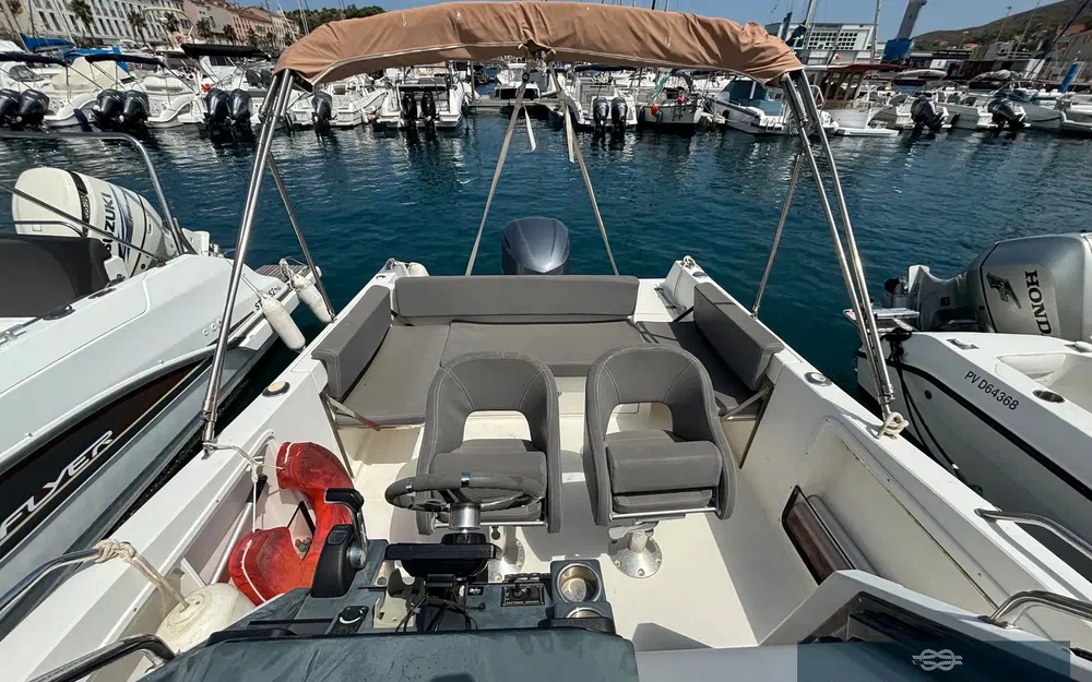 slider 9 Pacific Craft 750 Open