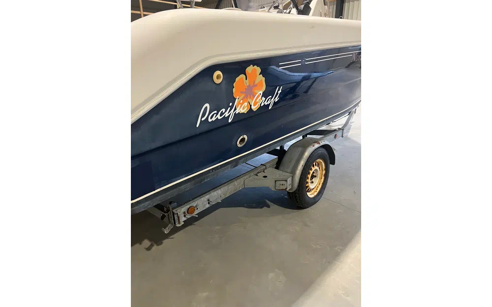 slider 7 Pacific Craft 545 Open