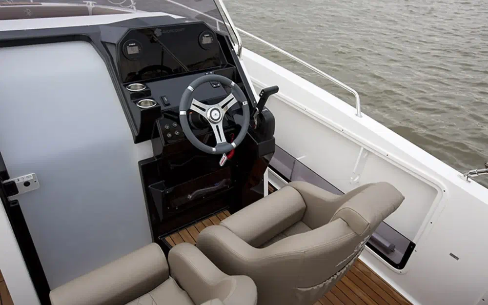 slider 11 Pacific Craft 750 Open